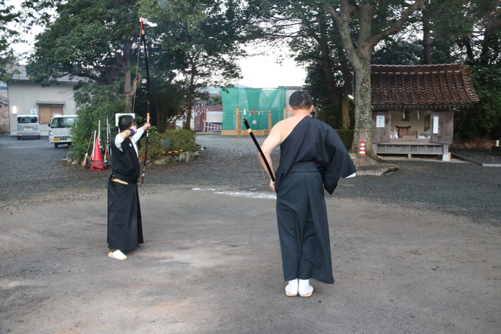 矢を射る射手